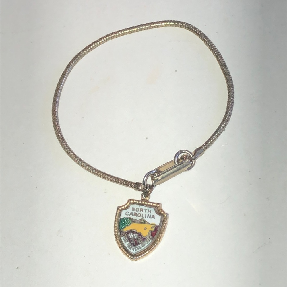 Gold Tone North Carolina Shield Charm Bracelet